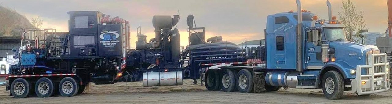 J.R.'s pressure pumping units lined up in the yard